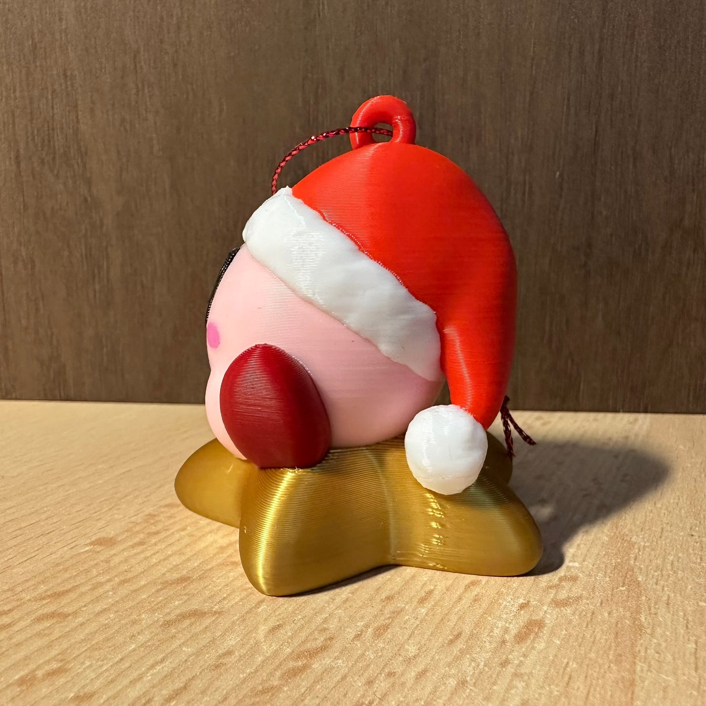 Boule de Noël Kirby sur son étoile