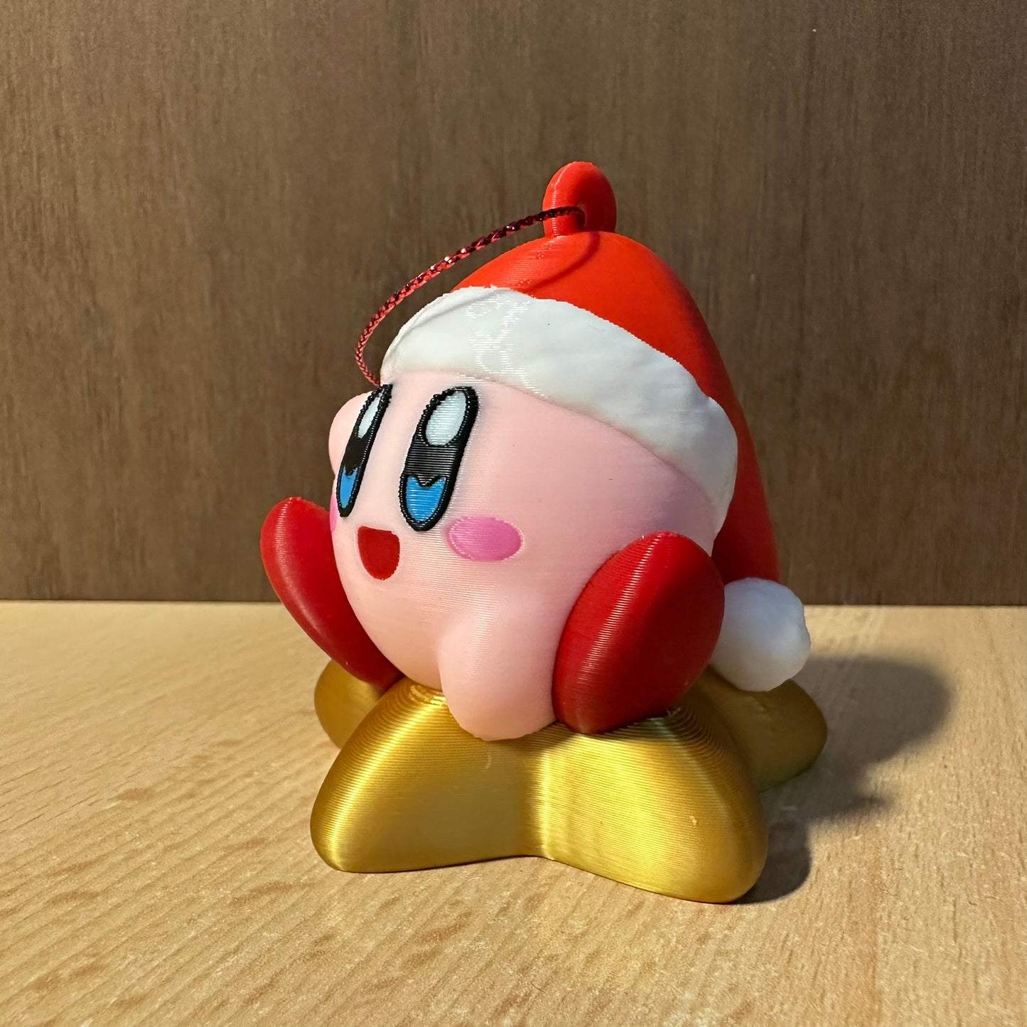 Boule de Noël Kirby sur son étoile