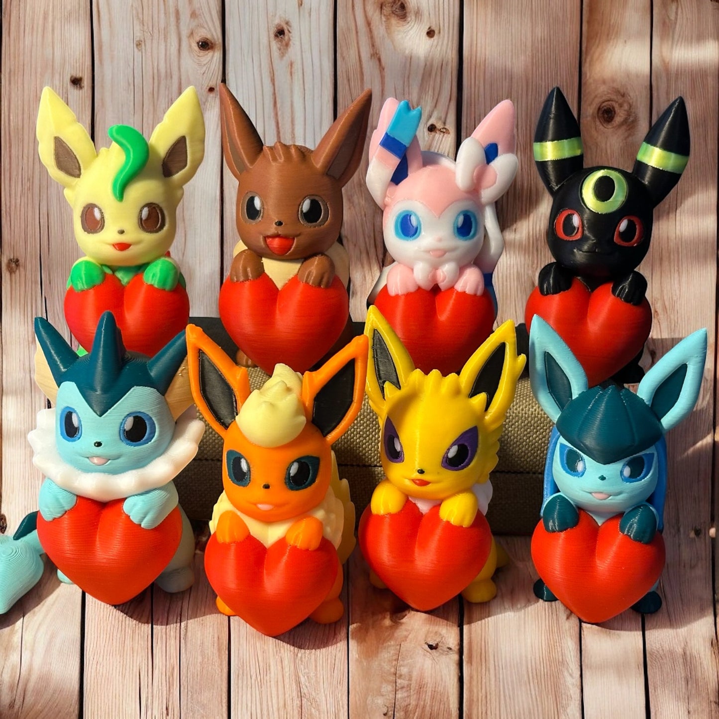 Figurine Pokémon amoureux Evoli (Eevee) et ses évolutions