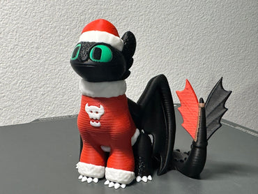 Krokmou (Dragon) dans son pull de Noël