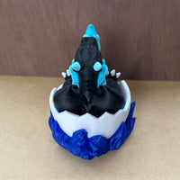 Figurine Pokemon Mega Dracofeu dans son oeuf